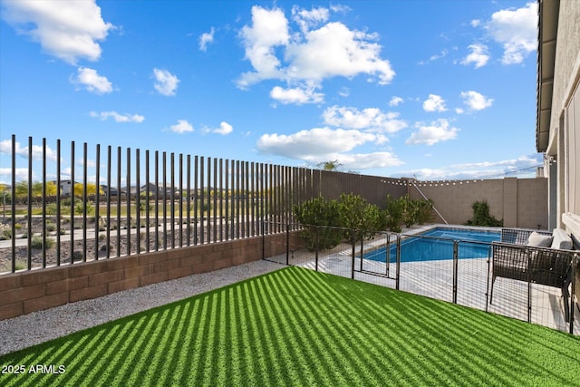 view of pool with a yard, a patio, a fenced in pool, and a fenced backyard