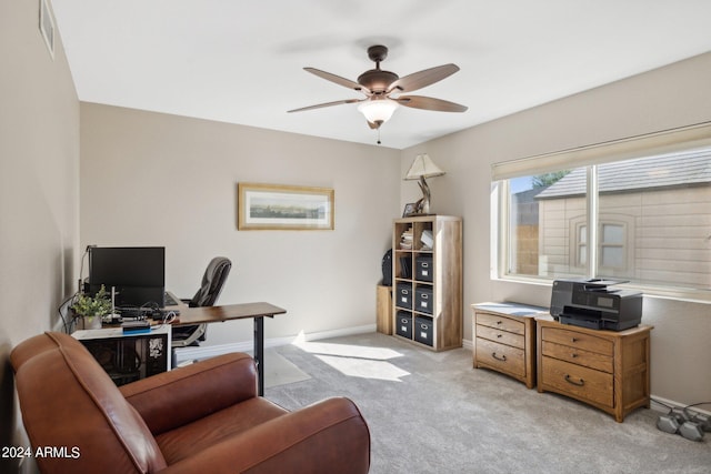 home office with light colored carpet and ceiling fan