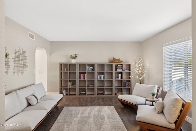 living room featuring dark hardwood / wood-style flooring