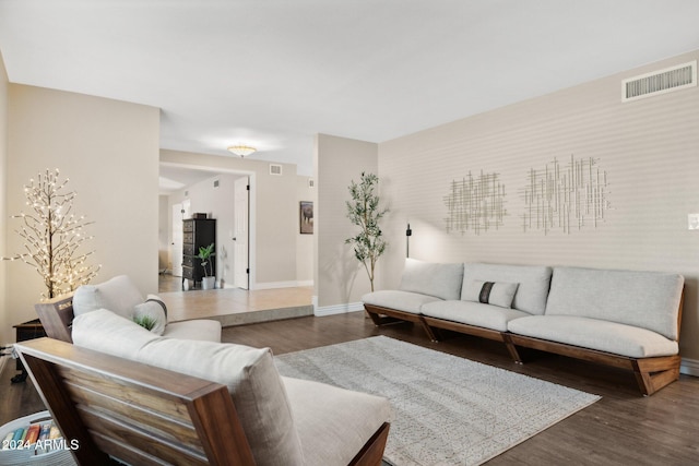 living room with dark wood-type flooring