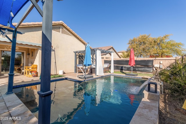 view of pool with a patio and a pergola