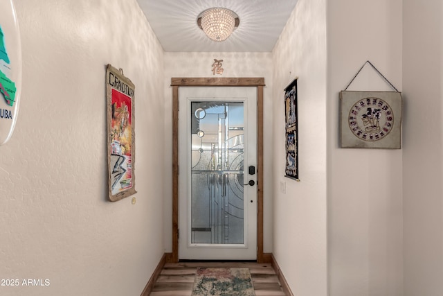 doorway to outside featuring light hardwood / wood-style floors