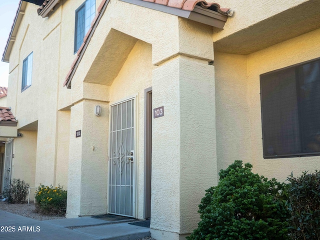 455 S Mesa Dr Unit 104, Mesa, AZ 85210 - entrance to property with stucco siding and a tiled roof