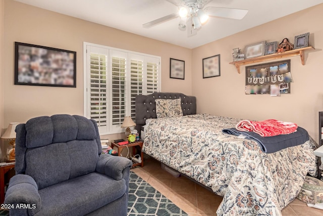 bedroom with tile patterned flooring and ceiling fan