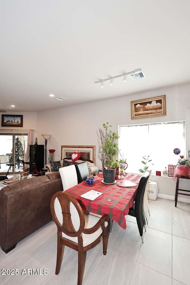 16705 E Almont Dr Unit A, Fountain Hills, AZ 85268 - dining area featuring recessed lighting, light tile patterned flooring, track lighting, and visible vents