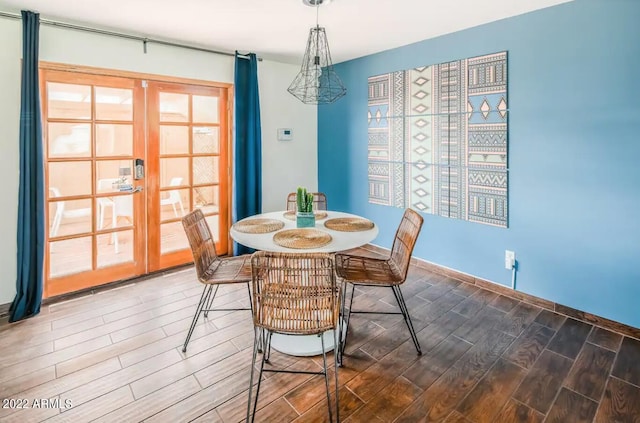 6945 E Osborn Rd Unit B, Scottsdale, AZ 85251 - dining area with wood finished floors and baseboards
