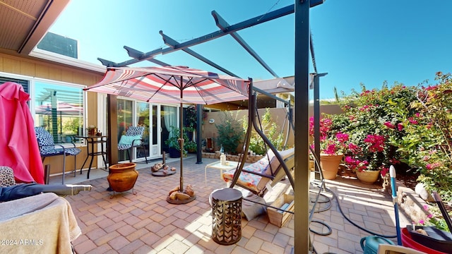 view of patio featuring a pergola