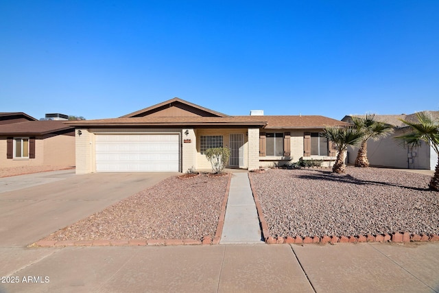 ranch-style home with a garage