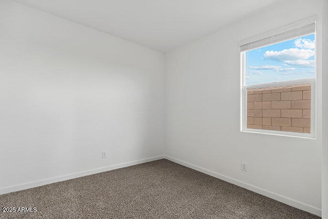 8474 W Clemente Way, Florence, AZ 85132 - spare room featuring baseboards and carpet floors