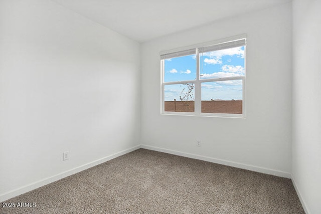 8474 W Clemente Way, Florence, AZ 85132 - carpeted empty room with baseboards
