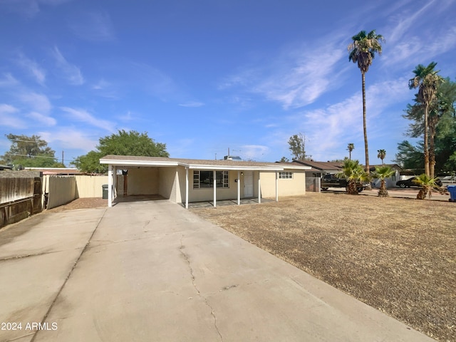 view of front of house featuring a carport