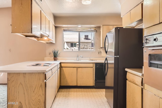 736 E Loyola Dr, Tempe, AZ 85282 - kitchen with oven, light countertops, freestanding refrigerator, a peninsula, and electric stovetop