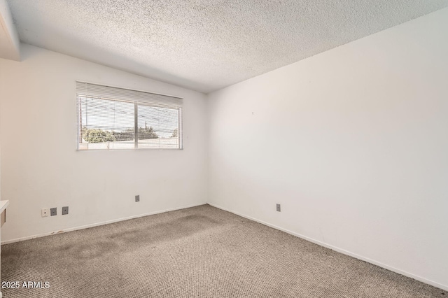 736 E Loyola Dr, Tempe, AZ 85282 - carpeted empty room featuring a textured ceiling and baseboards