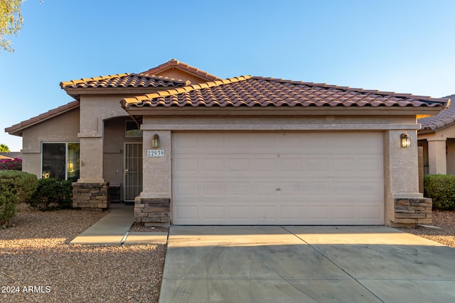 view of front of house with a garage