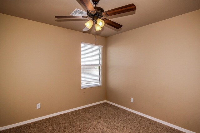 empty room featuring carpet flooring