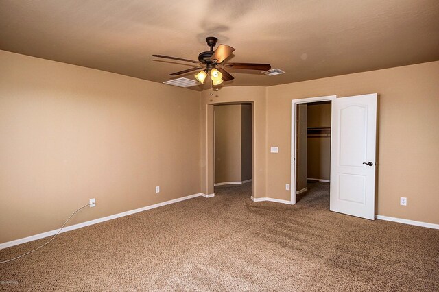 unfurnished bedroom with carpet flooring and ceiling fan