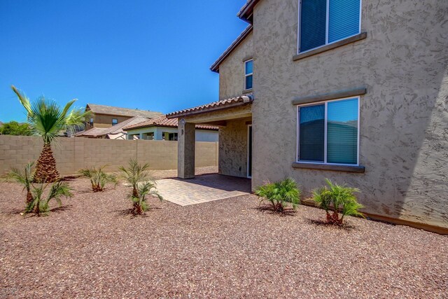 rear view of house featuring a patio area