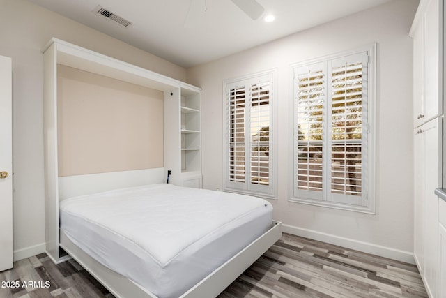 15583 W Big Sky Dr, Surprise, AZ 85374 - bedroom featuring hardwood / wood-style flooring and ceiling fan