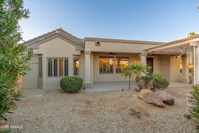 15583 W Big Sky Dr, Surprise, AZ 85374 - back of property with a patio and ceiling fan