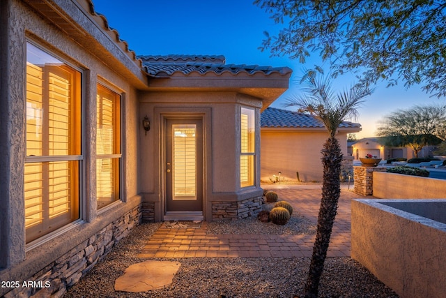 15583 W Big Sky Dr, Surprise, AZ 85374 - view of exterior entry at dusk