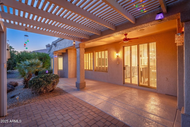 15583 W Big Sky Dr, Surprise, AZ 85374 - patio terrace at dusk featuring a pergola and ceiling fan