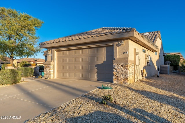 15583 W Big Sky Dr, Surprise, AZ 85374 - exterior space with a garage and central air condition unit