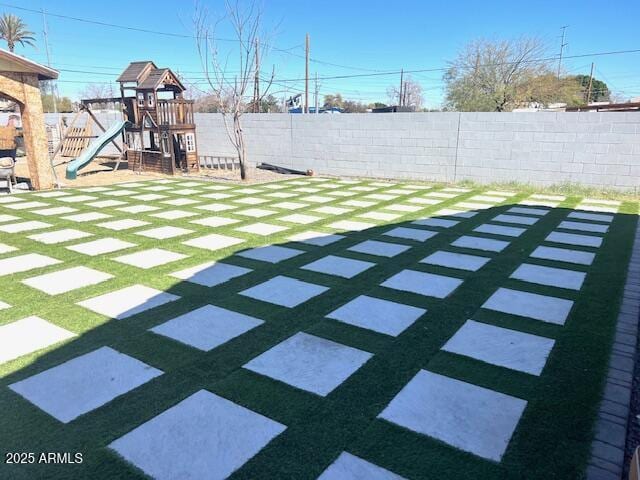 6128 W Palmaire Ave, Glendale, AZ 85301 - view of yard with a playground