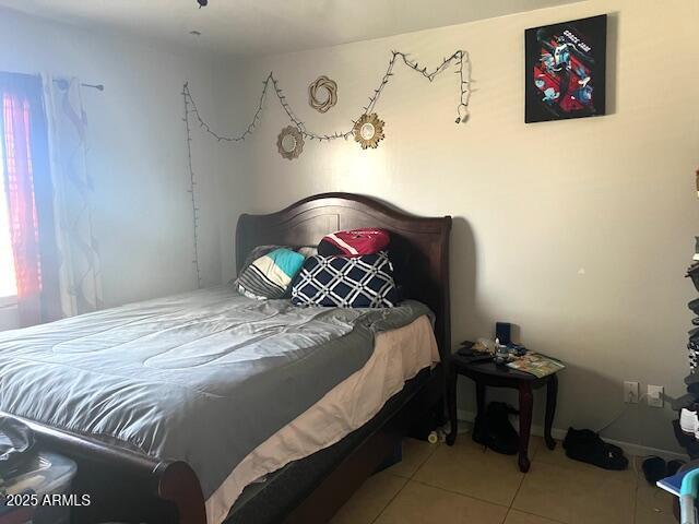 6128 W Palmaire Ave, Glendale, AZ 85301 - bedroom with tile patterned flooring