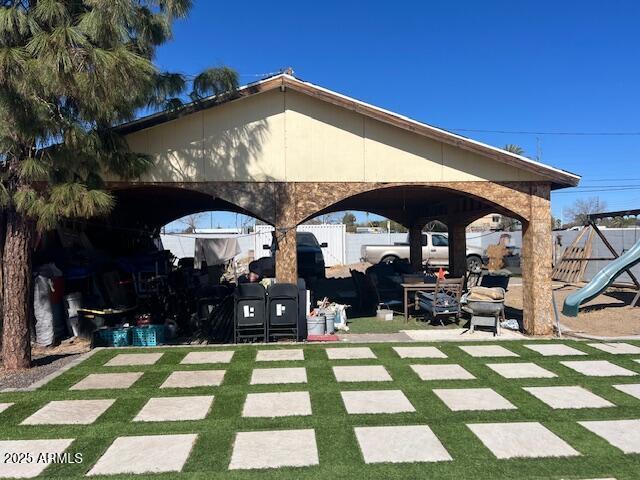 6128 W Palmaire Ave, Glendale, AZ 85301 - view of patio with a playground