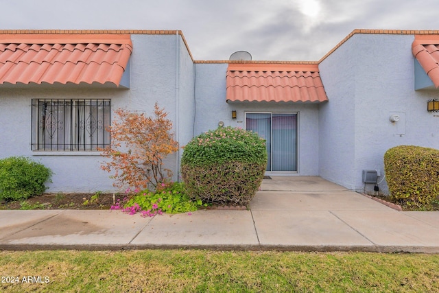 view of home's exterior featuring a patio