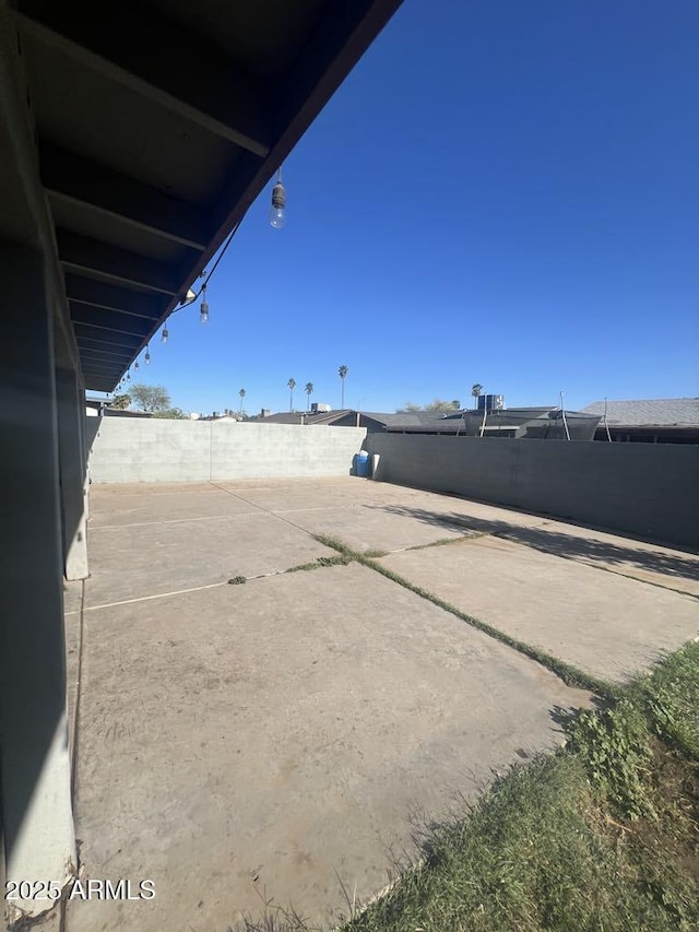 6429 W Palm Ln, Phoenix, AZ 85035 - fenced backyard featuring a patio