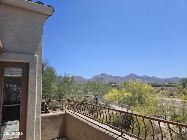 balcony featuring a mountain view