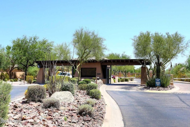 surrounding community featuring aphalt driveway