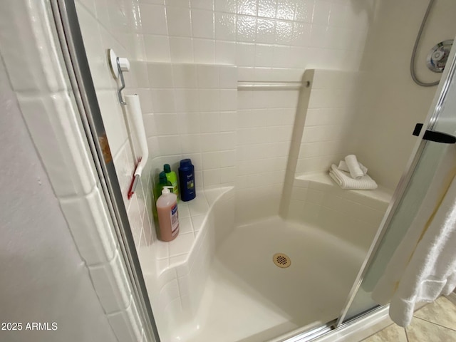 bathroom featuring a stall shower