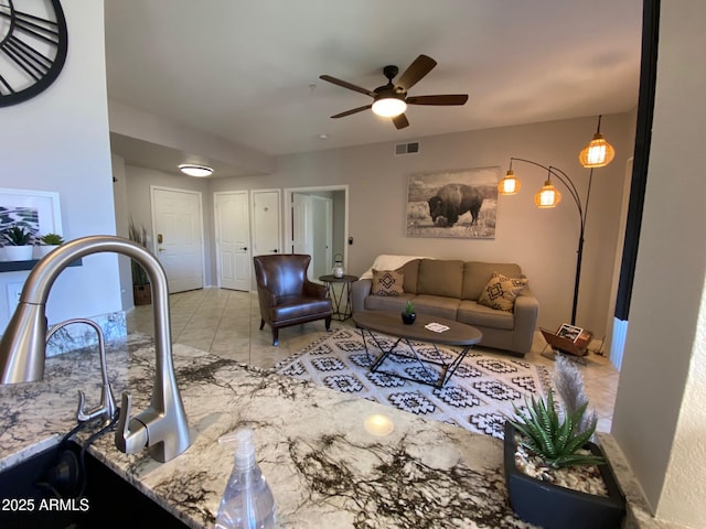 living room featuring ceiling fan