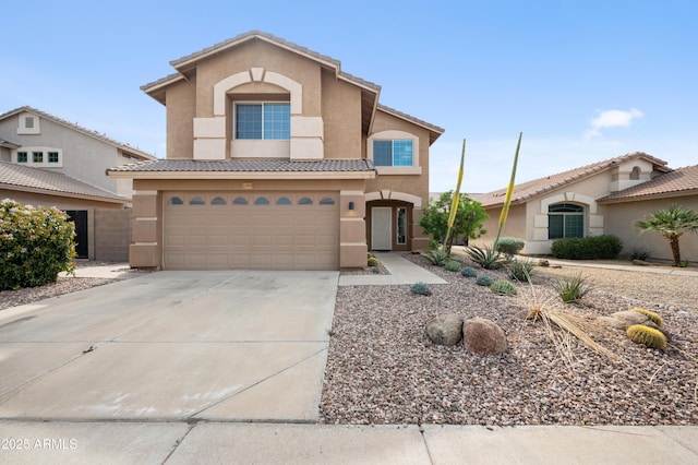 23211 N 22nd Pl, Phoenix, AZ 85024 - view of front of house featuring stucco siding, a tile roof, concrete driveway, and an attached garage