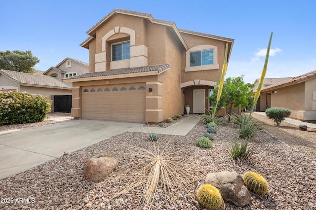 23211 N 22nd Pl, Phoenix, AZ 85024 - view of front of house with a tiled roof, a garage, driveway, and stucco siding