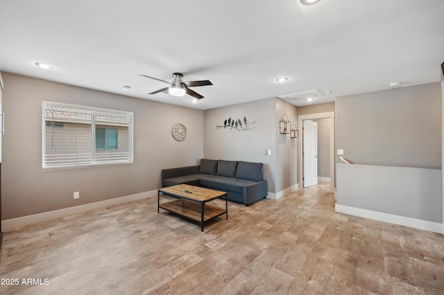 23211 N 22nd Pl, Phoenix, AZ 85024 - living room with a ceiling fan, attic access, baseboards, light wood-style floors, and recessed lighting