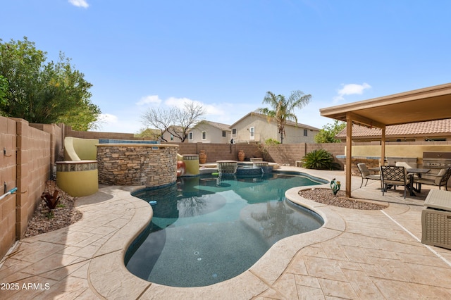 23211 N 22nd Pl, Phoenix, AZ 85024 - view of pool featuring a fenced backyard, a pool with connected hot tub, area for grilling, and a patio area