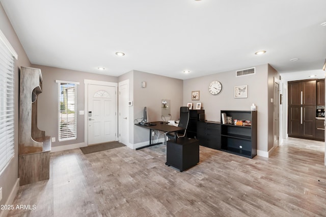 23211 N 22nd Pl, Phoenix, AZ 85024 - home office featuring baseboards, visible vents, recessed lighting, and light wood-type flooring