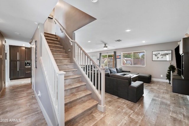 23211 N 22nd Pl, Phoenix, AZ 85024 - staircase featuring visible vents, baseboards, ceiling fan, wood finished floors, and recessed lighting