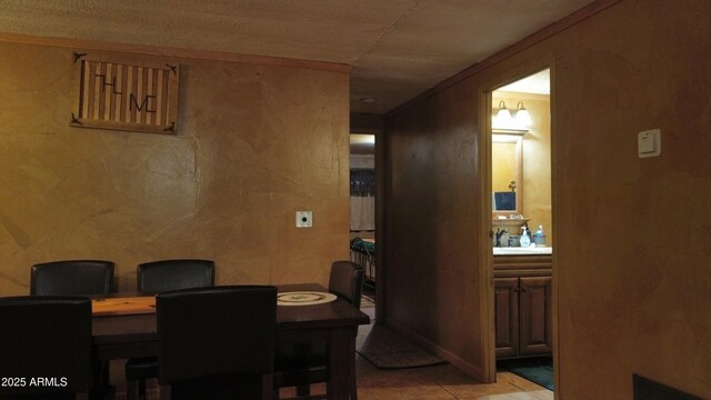 dining space featuring light tile patterned flooring and visible vents