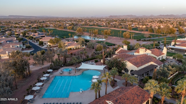 birds eye view of property with a residential view