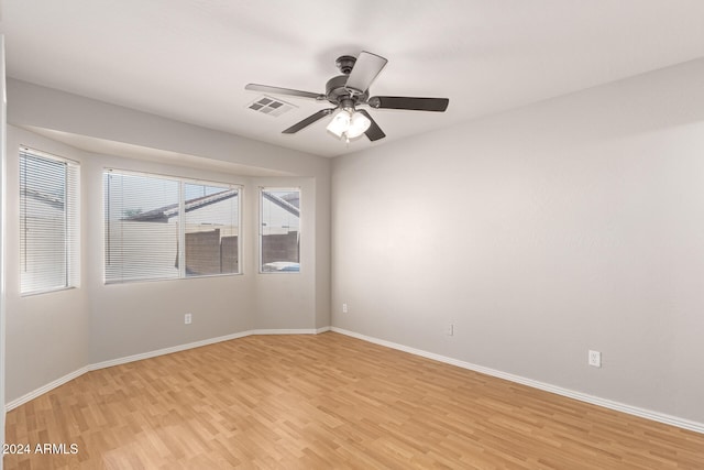 unfurnished room with light hardwood / wood-style floors and ceiling fan