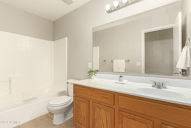 full bathroom featuring vanity, shower / washtub combination, toilet, and tile patterned floors