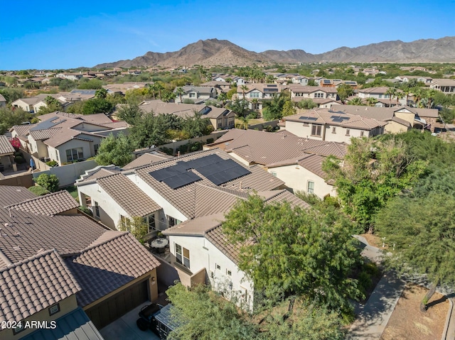 birds eye view of property featuring a mountain view