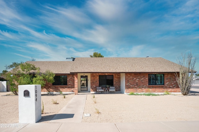 ranch-style house with a patio