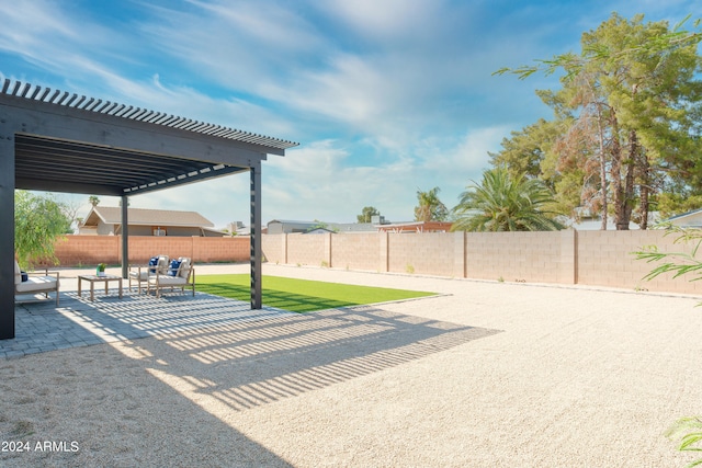 view of yard with a pergola and a patio