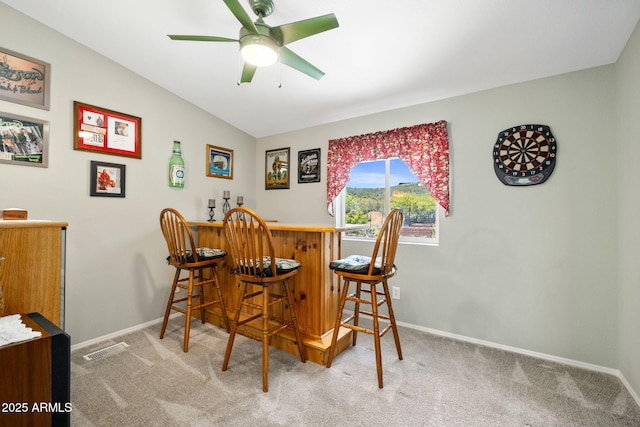 490 S Hideaway Dr, Dewey, AZ 86327 - carpeted dining space with a dry bar, baseboards, and ceiling fan