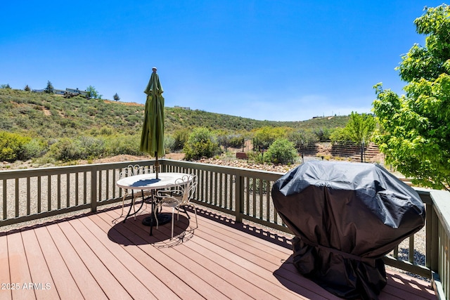 490 S Hideaway Dr, Dewey, AZ 86327 - wooden terrace with outdoor dining area and area for grilling